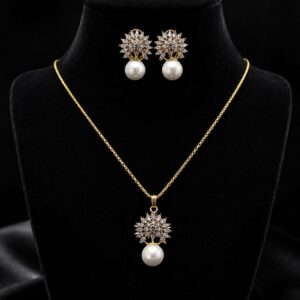 Gold floral pearl pendant necklace with matching earrings